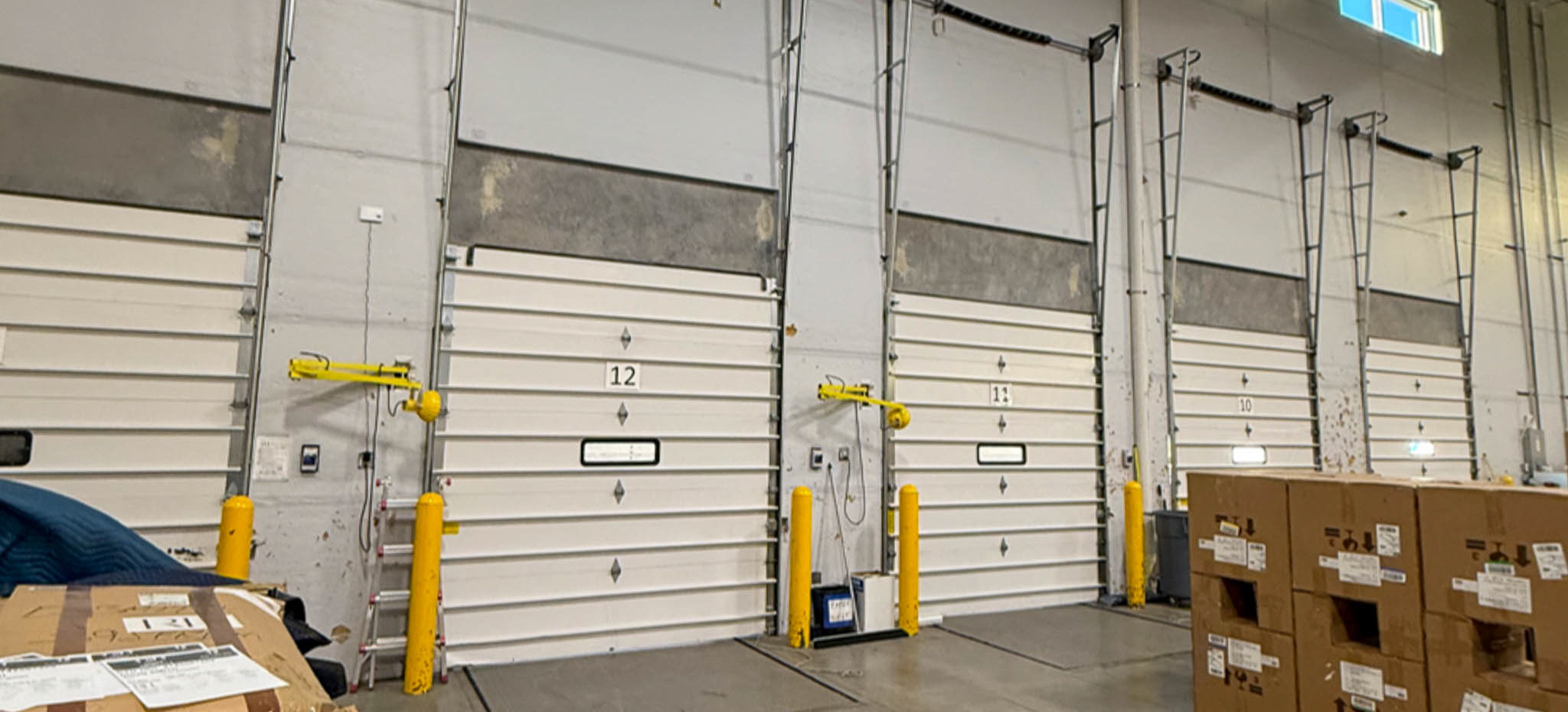 Manufacturing facility door systems